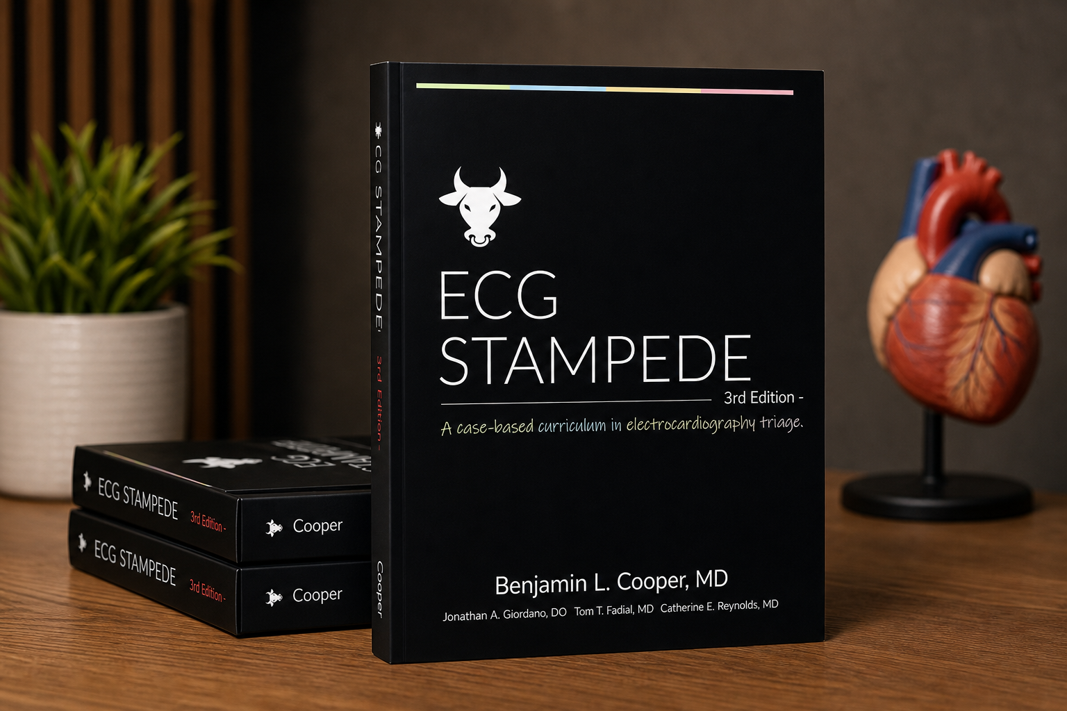 ECG Stampede third-edition book with stacked copies