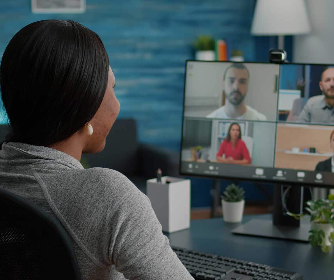 Student participating in video classroom